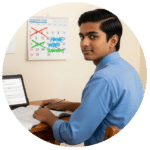 A boy in front of laptop